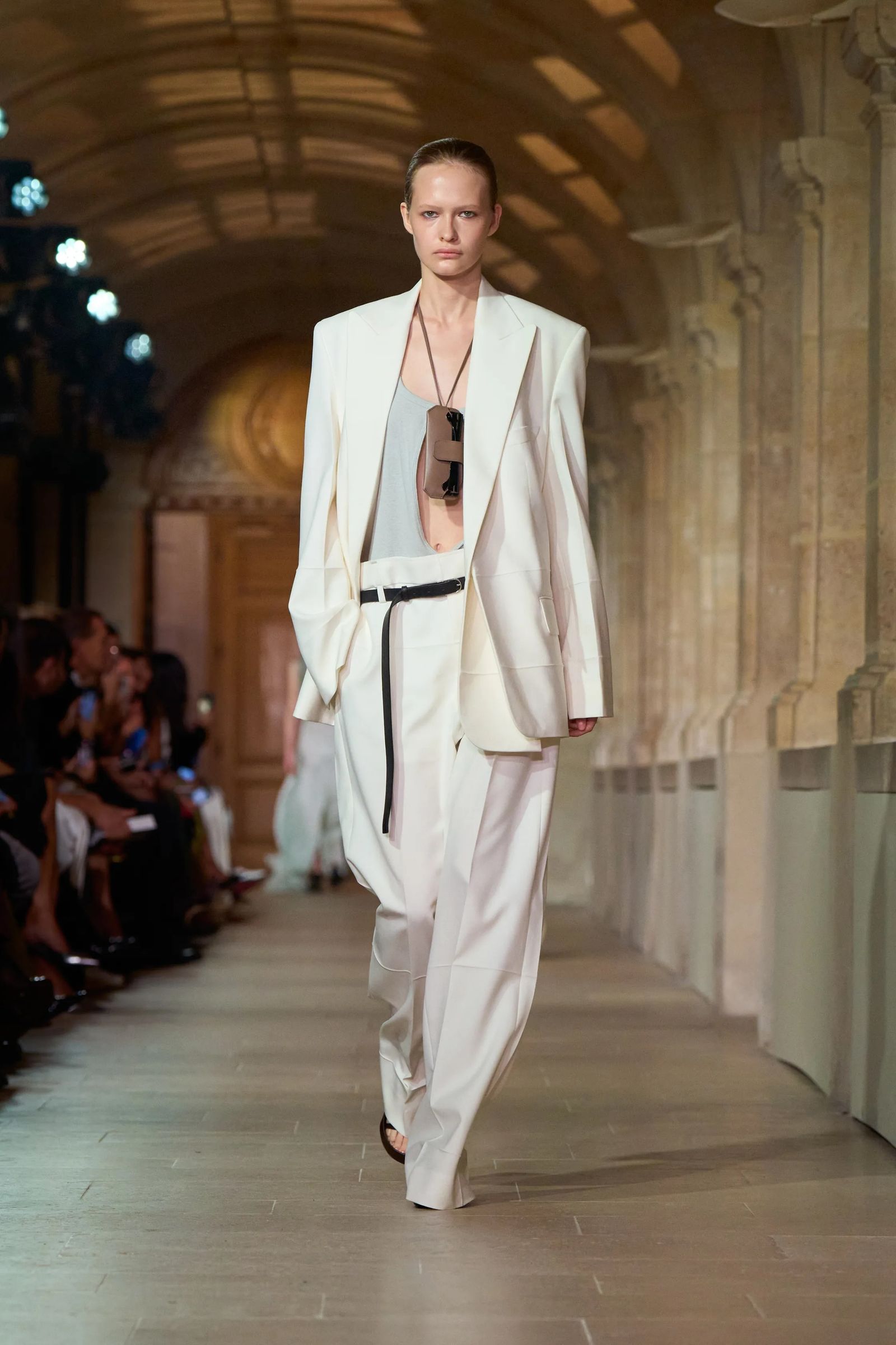 Image may contain Fashion Clothing Formal Wear Suit Coat Adult and Person