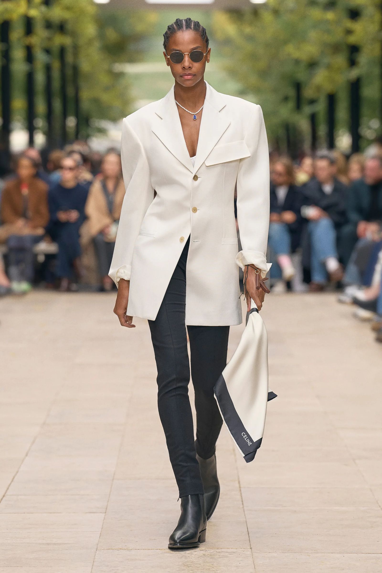 Image may contain Blazer Clothing Coat Jacket Formal Wear Suit Adult Person and Pants