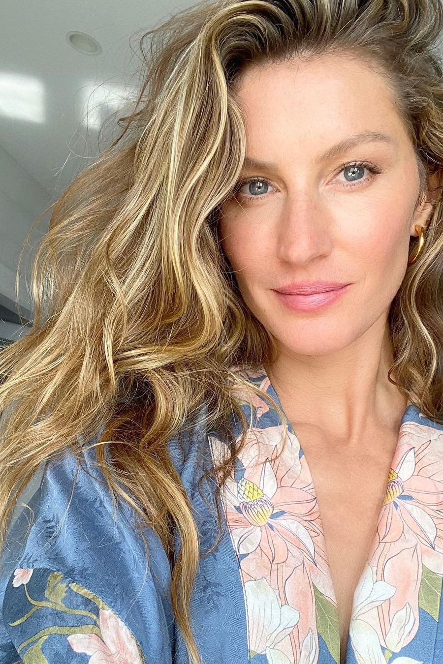 Image may contain Gisele Bündchen Face Human Person Clothing Apparel and Home Decor