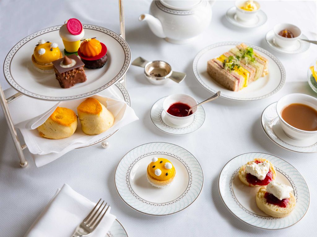 Image may contain Cutlery Fork Spoon Food Confectionery Sweets Dessert Dish Meal Pottery Saucer Creme and Cream