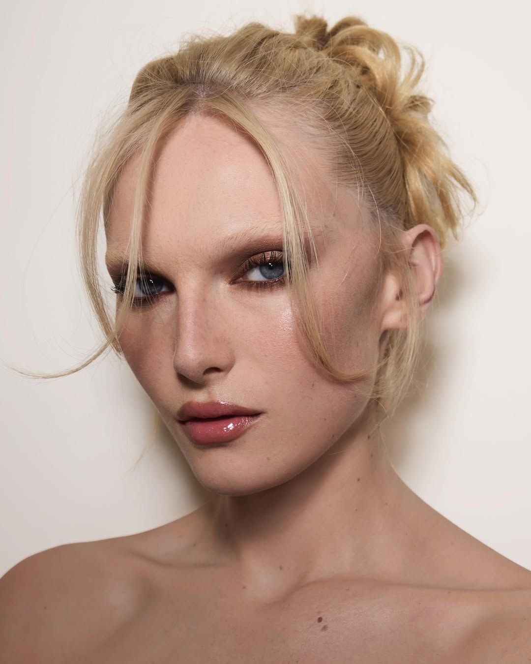 Image may contain Snejana Onopka Blonde Hair Person Head Adult Face Photography and Portrait