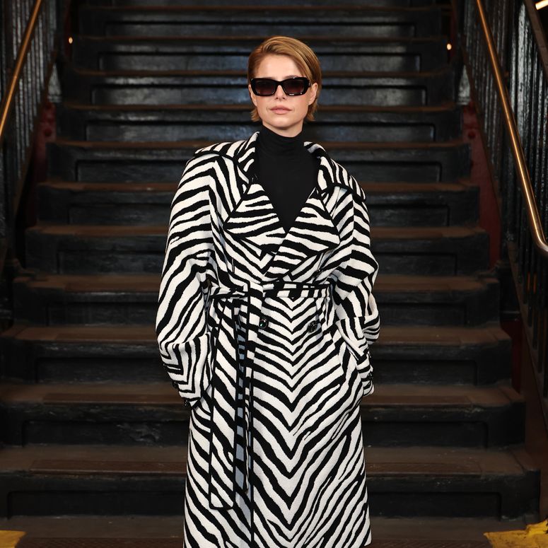 Image may contain: Clothing, Coat, Person, and Overcoat