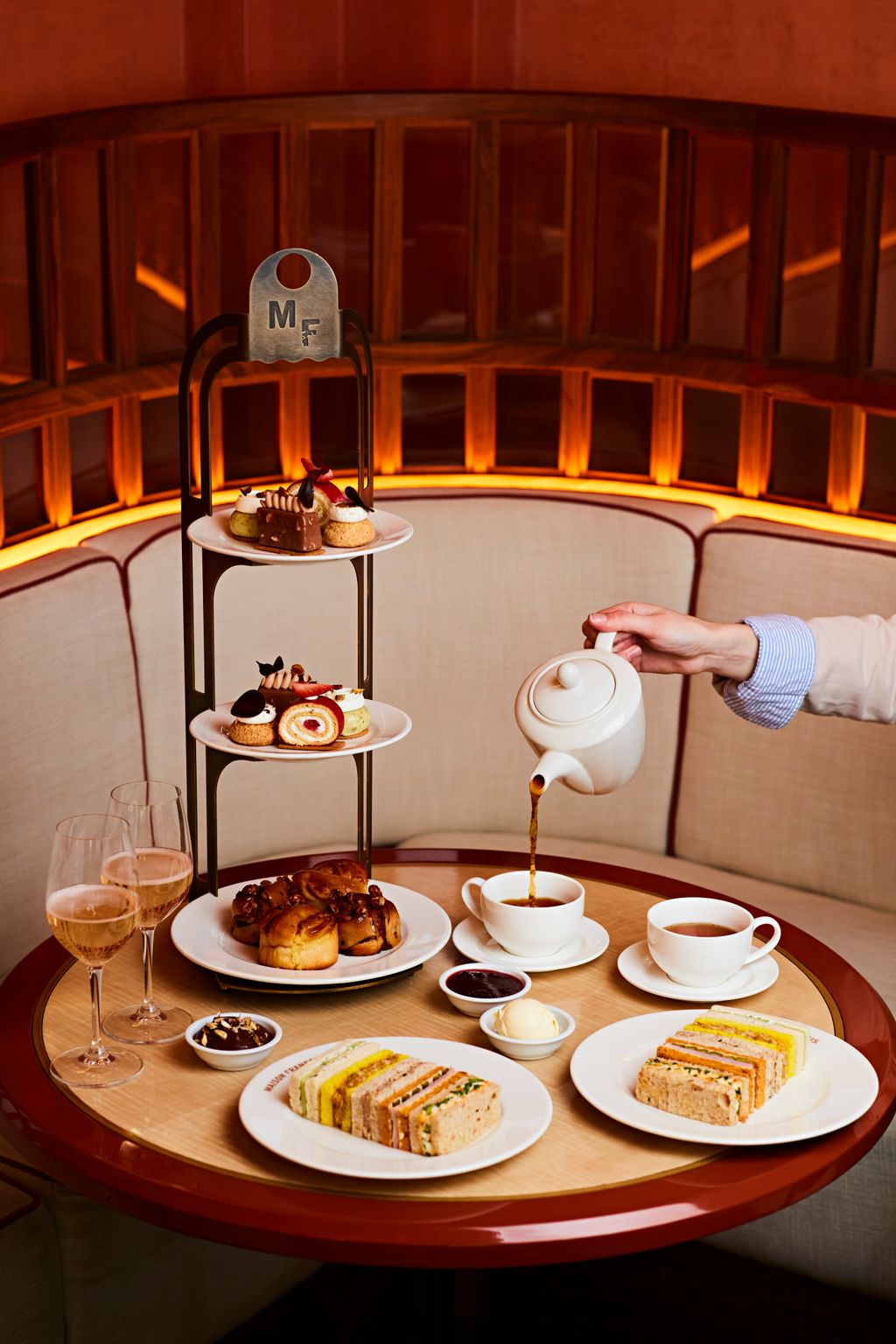 Image may contain Brunch Food Cup Plate Bread Person Furniture Table Tabletop Dining Table and Food Presentation