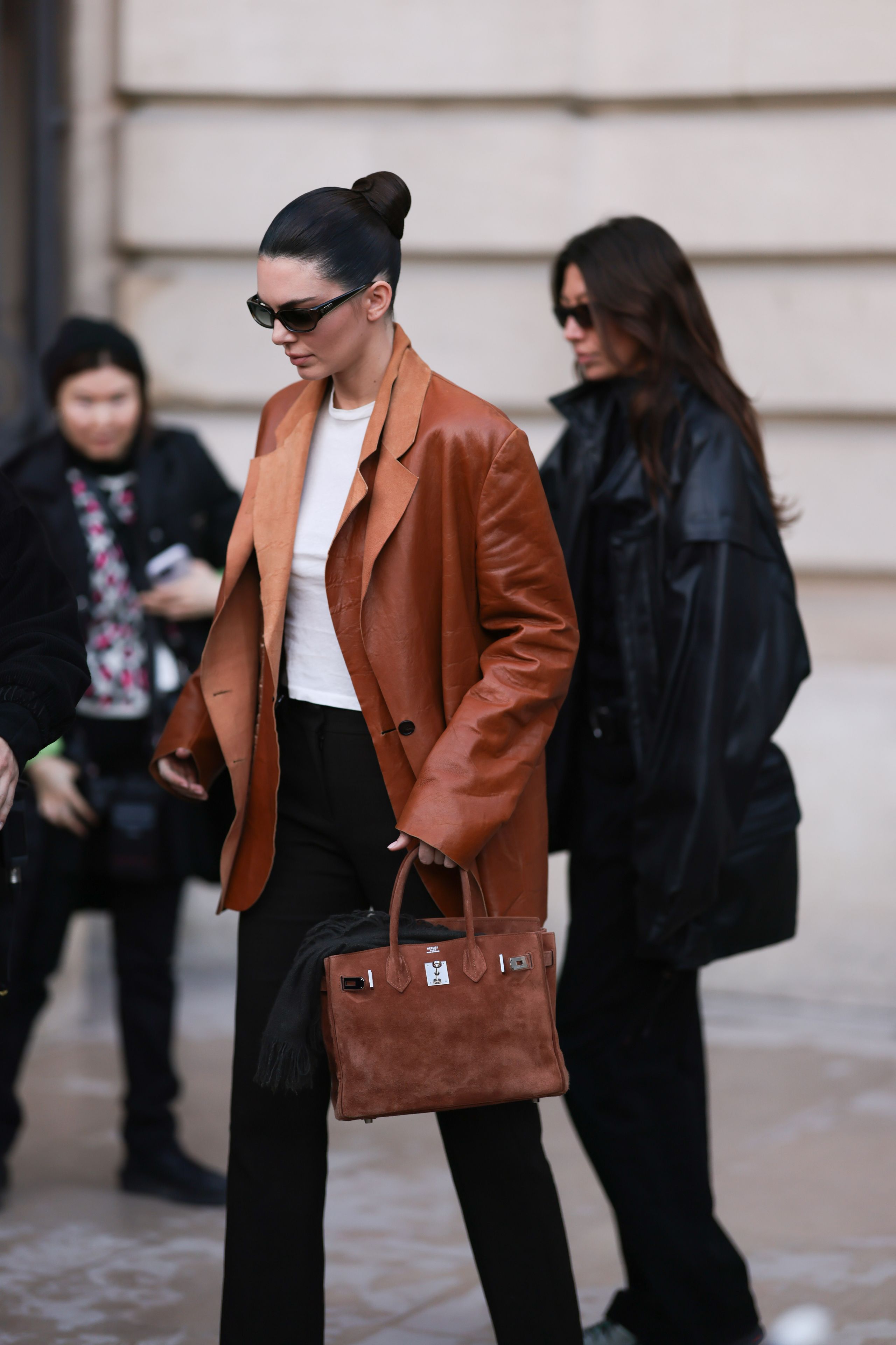 Image may contain Kendall Jenner Clothing Coat Jacket Accessories Bag Handbag Blazer Glasses Adult and Person