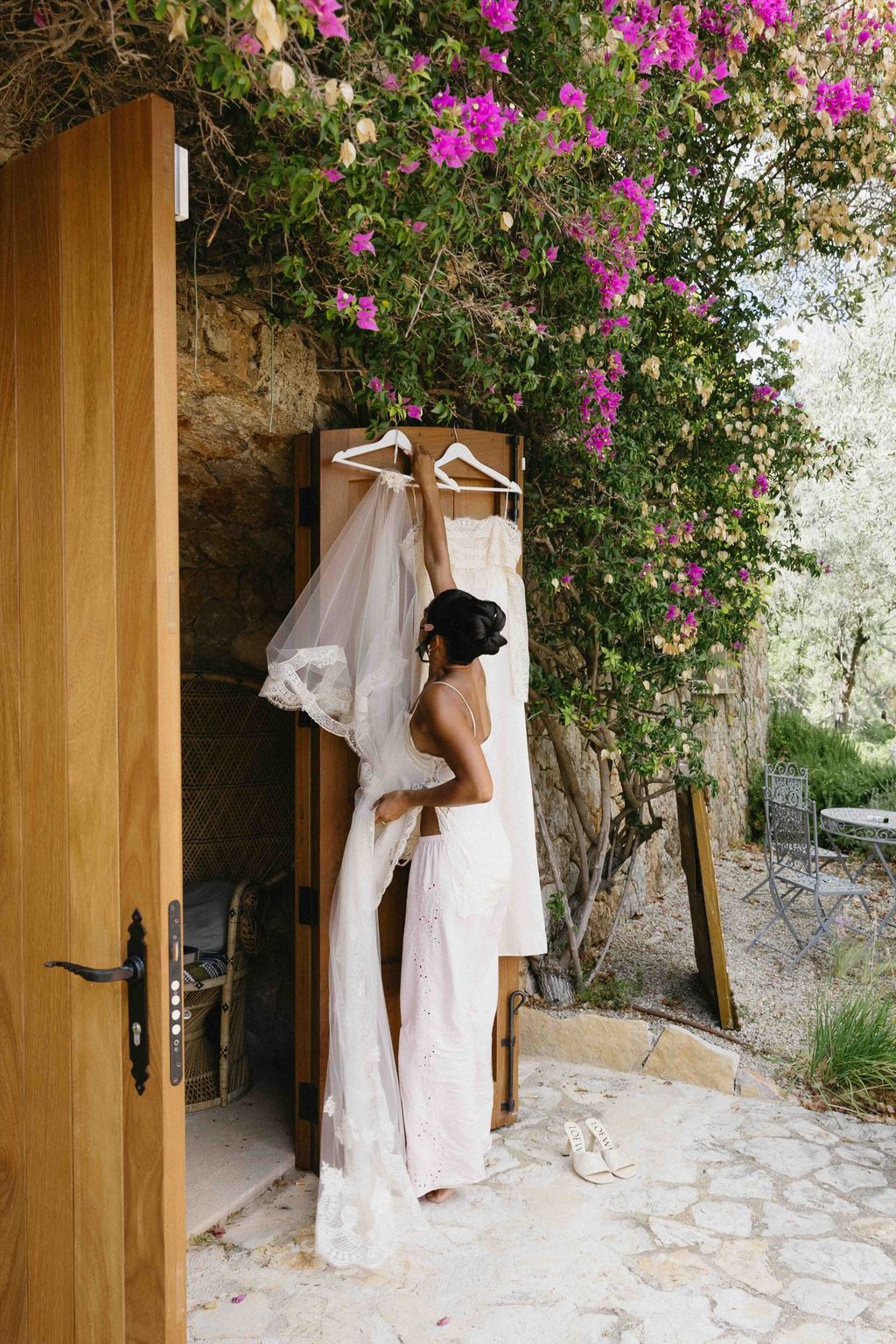 Image may contain Indoors Furniture Bed Bedroom Room Adult Person and Wedding