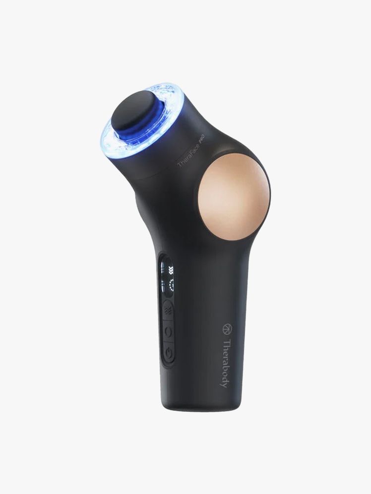 Image may contain: Lamp, Appliance, Blow Dryer, Device, Electrical Device, and Microphone