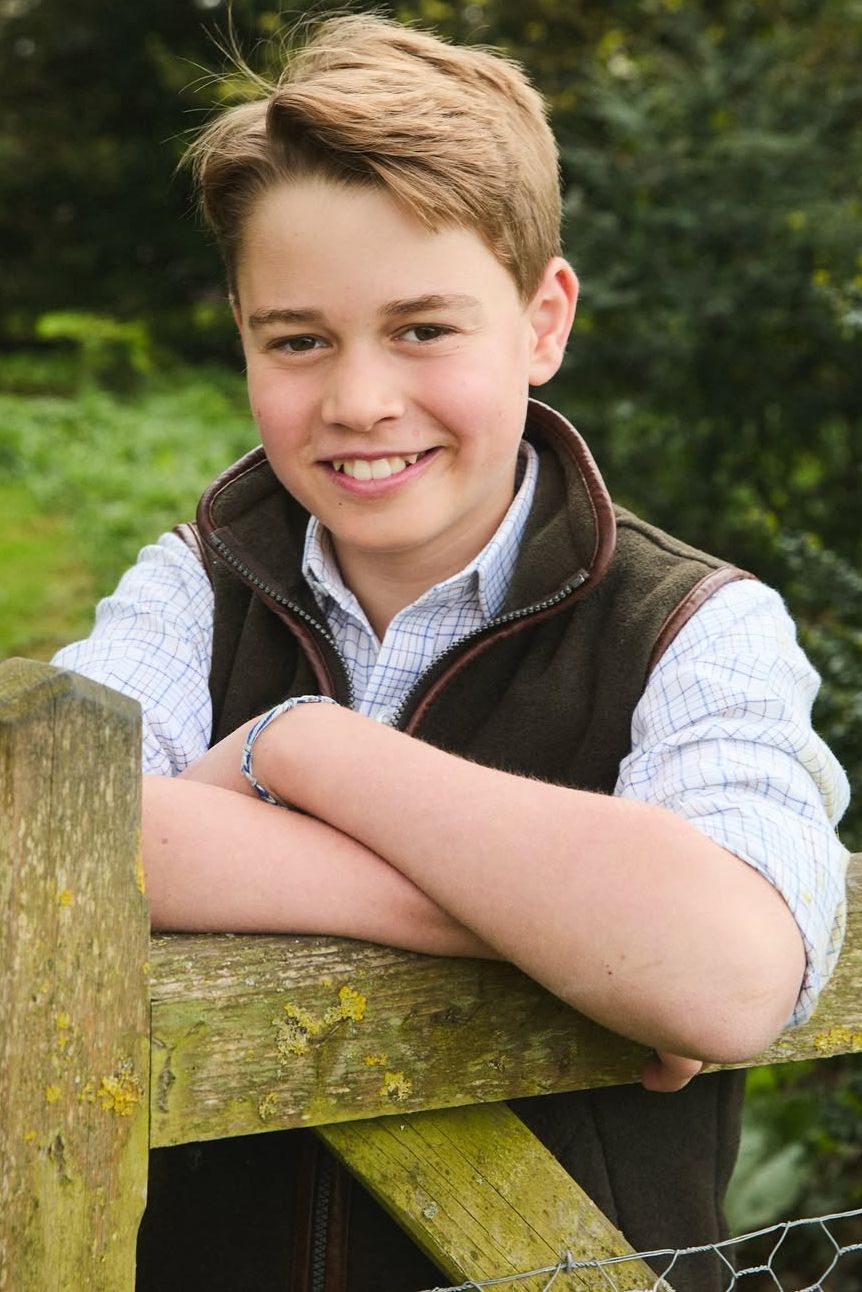 Image may contain Prince George of Cambridge Blonde Hair Person Face Happy Head Smile Teen and Photography
