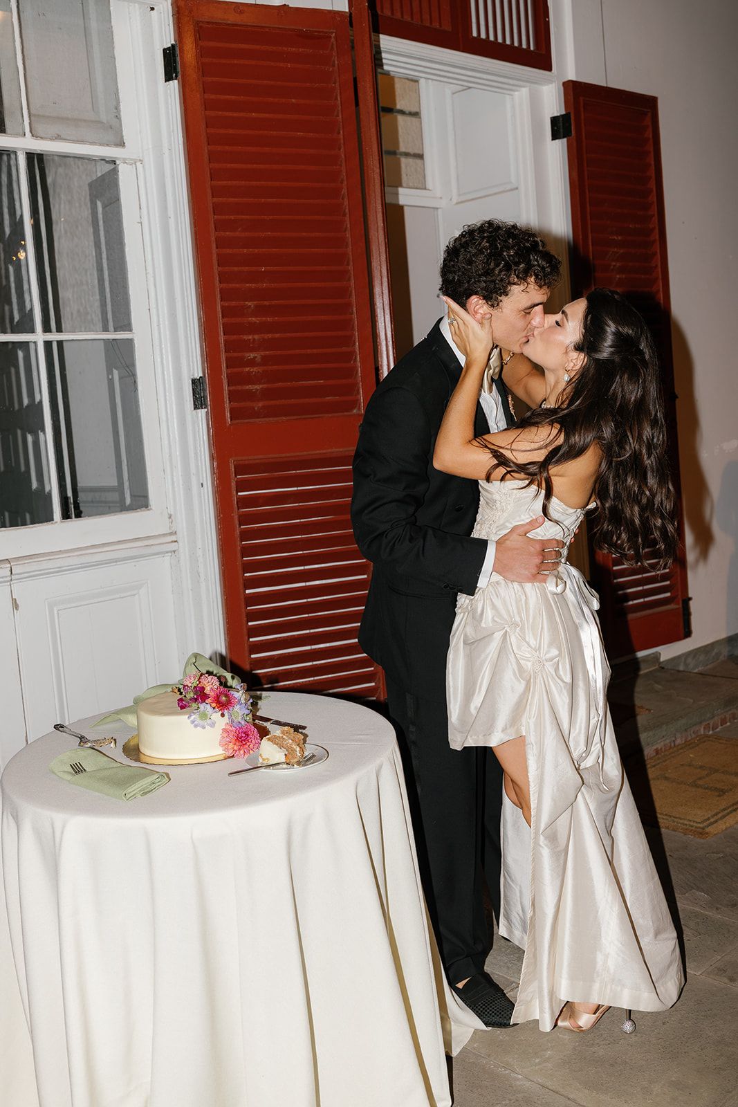 Image may contain Plant Potted Plant Face Head Person Photography Portrait Clothing Formal Wear Suit and Blazer