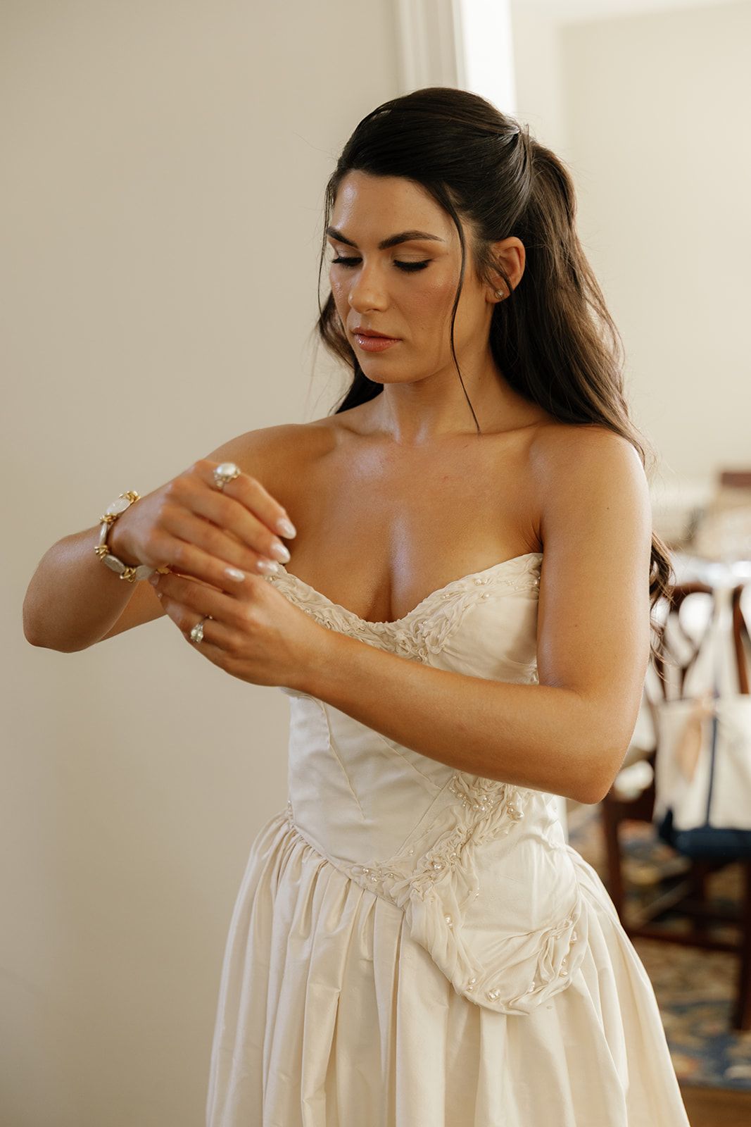 Image may contain Clothing Dress Fashion Formal Wear Gown Wedding Wedding Gown Adult and Person