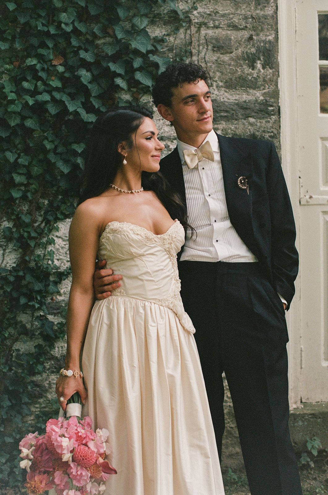 Image may contain Blazer Clothing Coat Jacket Formal Wear Suit Adult Person Wedding Dress Face and Head