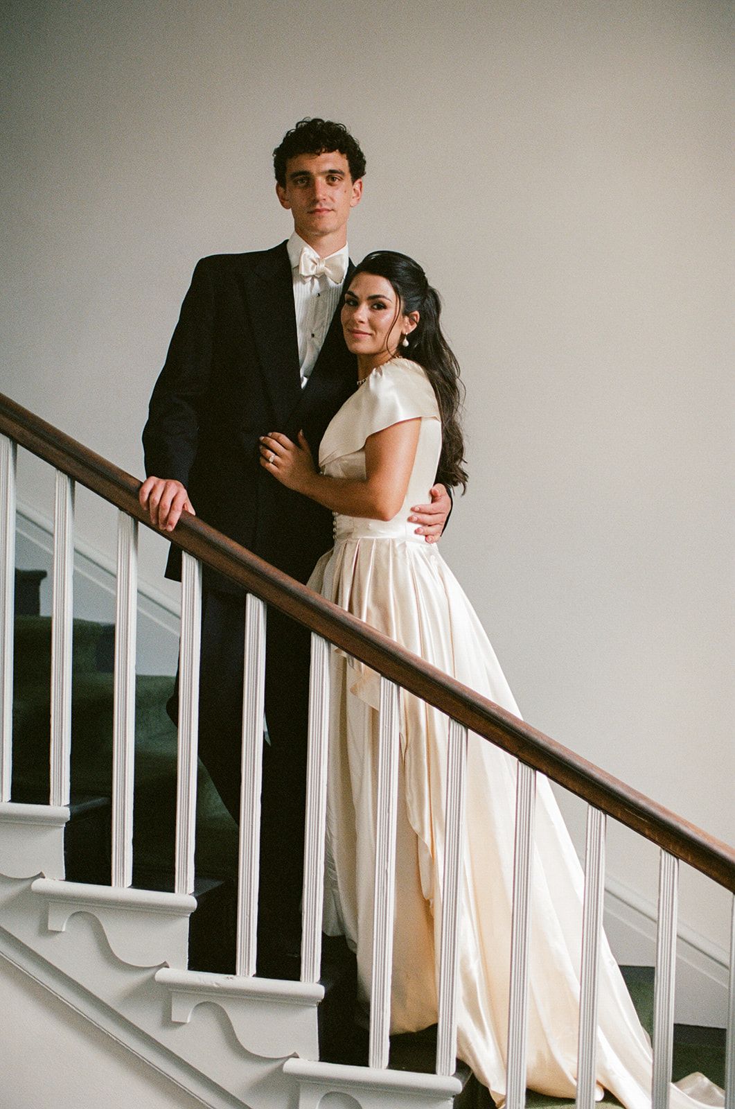 Image may contain Blazer Clothing Coat Jacket Formal Wear Suit Architecture Building House Housing and Staircase