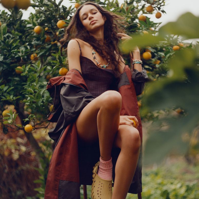 Image may contain: Binx Walton, Person, Sitting, Face, Happy, Head, Smile, Adult, Photography, and Portrait