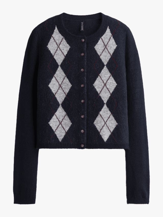Image may contain Clothing Knitwear Sweater and Cardigan
