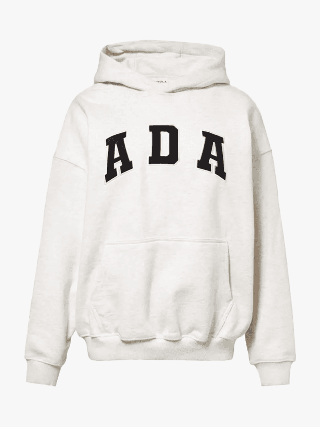 Image may contain: Clothing, Knitwear, Sweater, Sweatshirt, Hoodie, and Hood