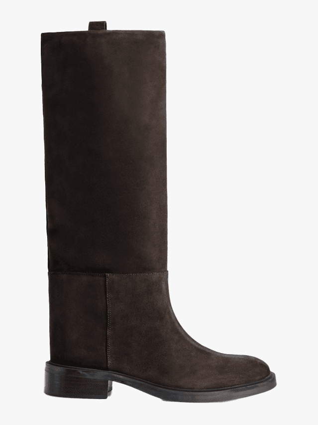 Image may contain: Boot, Clothing, Footwear, Riding Boot, and Shoe