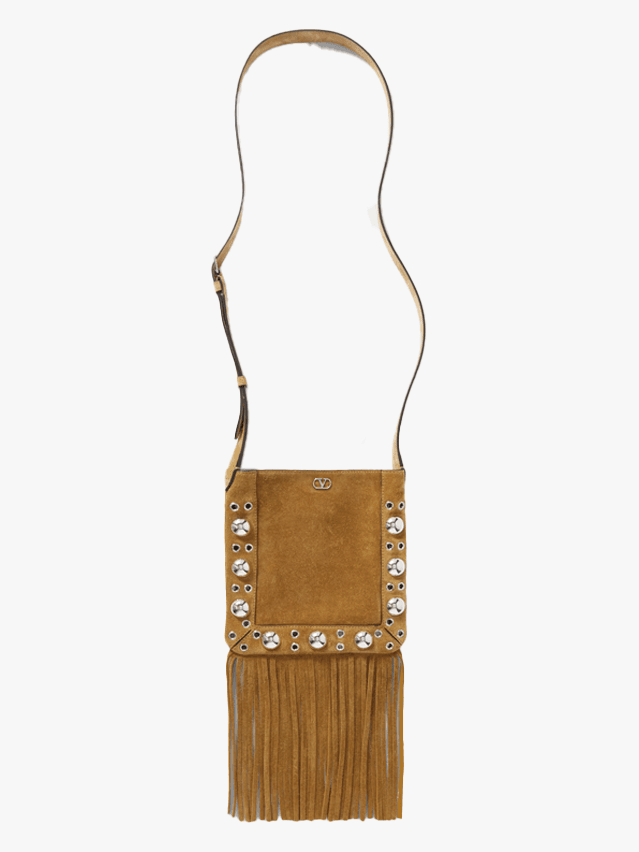 Image may contain: Accessories, Bag, Handbag, Purse, and Weapon