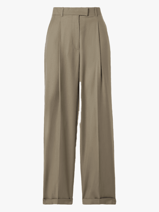 Image may contain Clothing Pants Khaki Skirt Home Decor and Linen
