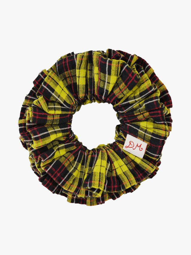 Image may contain: Tartan, Blouse, and Clothing