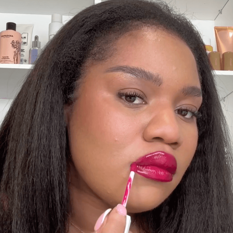 Vogue writer applies a pink lip stain
