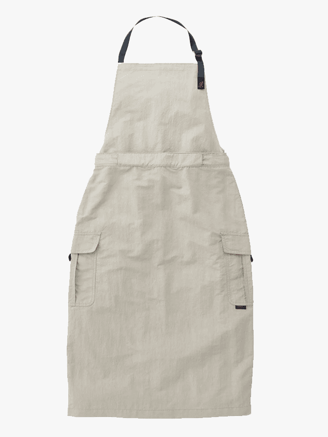 Image may contain: Apron, Clothing, Accessories, Bag, and Handbag