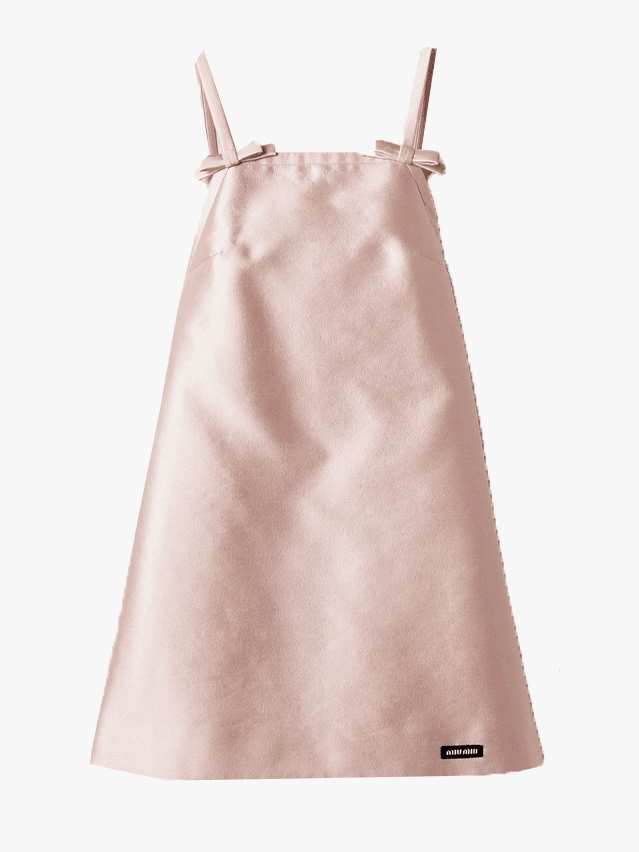 Image may contain: Clothing, Skirt, Dress, Accessories, Bag, Handbag, and Formal Wear