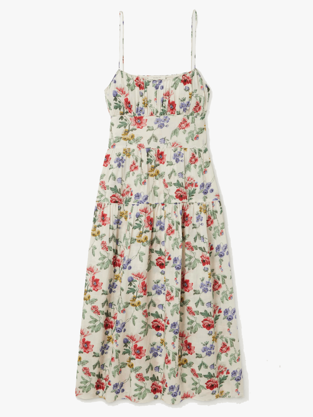 Image may contain: Clothing, Dress, Blouse, and Skirt