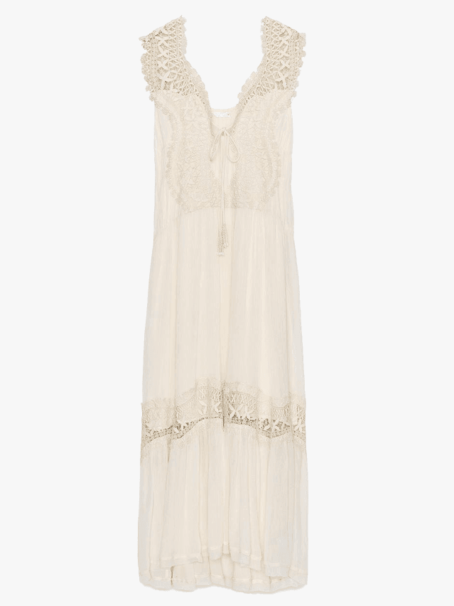 Image may contain Clothing Dress Blouse Formal Wear Fashion Gown Wedding Wedding Gown and Home Decor